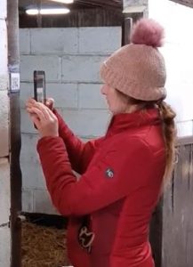 An employee using the Location Clock app to scan a QR code